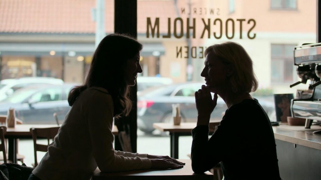 Two female friends at a café in Stockholm